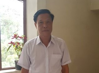 Ông Trần Quang Huy, cán bộ thôn gương mẫu - ảnh 1