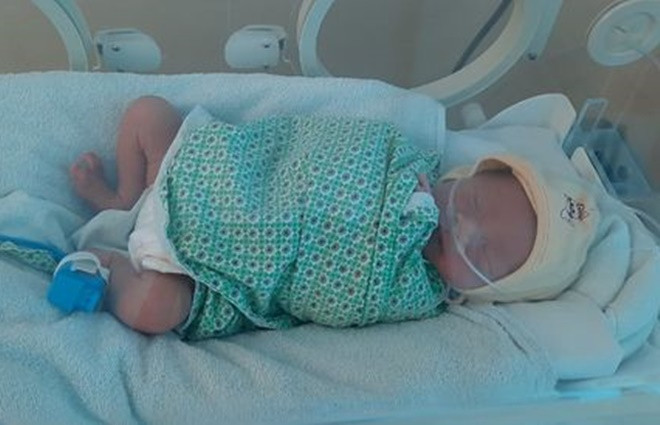 Một bé sơ sinh bị bỏ rơi tại Hà Nội - 1