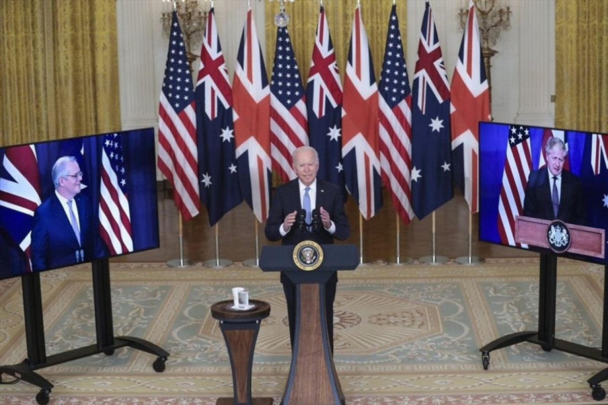 Tổng thống Mỹ Joe Biden, Thủ tướng Anh Boris Johnson và Thủ tướng Australia cùng nhau thông báo thành lập liên minh mới hôm 15/9. Ảnh: AFP