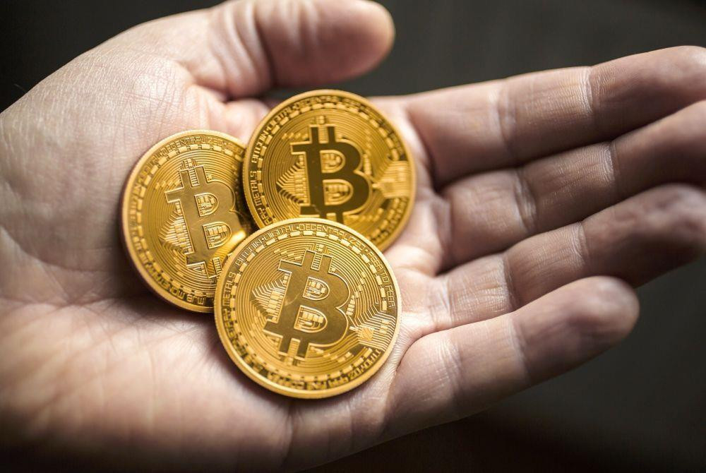 Giá Bitcoin hôm nay 14/10: Bitcoin vượt 57.000 USD, thị trường bùng nổ - 1