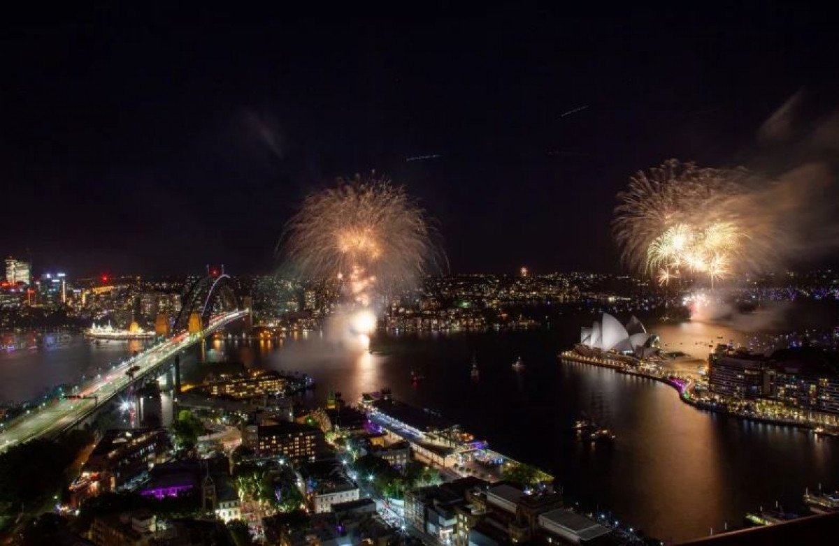 Pháo hoa mừng năm mới ở Sydney, Austrlia đánh dấu thời khắc chuyển sang năm mới 2022. Ảnh: EDWINA PICKLES
