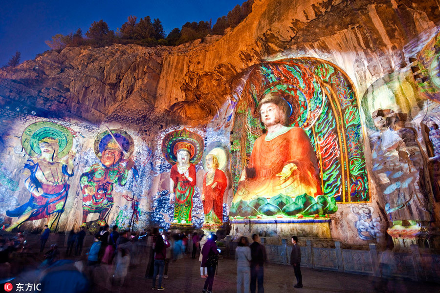 Di tích cổ chứa hơn 100.000 tượng Phật trong các hang động huyền ảo khi đêm về - 13