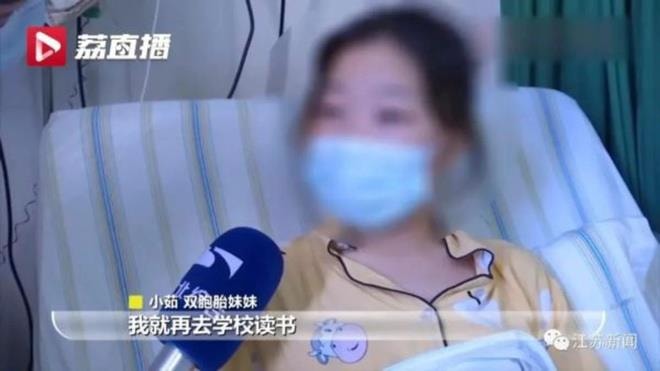 Cha mẹ cùng hiến thận để cứu con gái sinh đôi ở Trung Quốc - 2