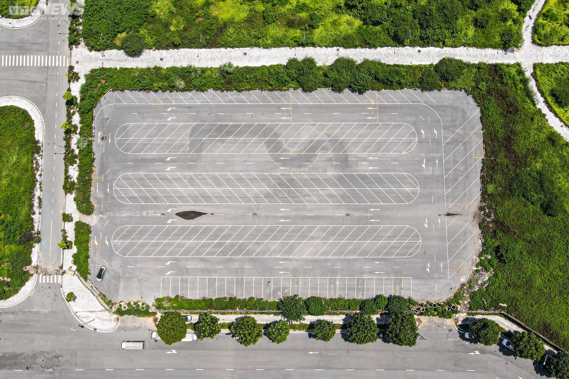 Sau 7 năm quy hoạch, công viên gần 100 ha thành nơi tập kết rác thải, dạy lái xe - 11