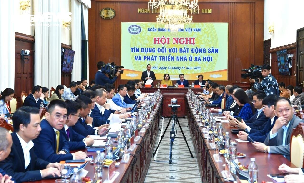 Hội nghị Tín dụng đối với bất động sản và phát triển nhà ở xã hội do Ngân hàng Nhà nước Việt Nam và Bộ Xây dựng chủ trì. (Ảnh: Đ.V)