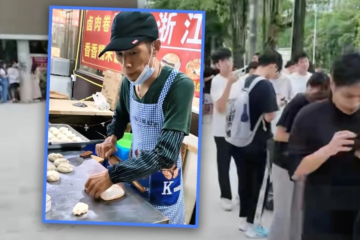 Sinh viên xếp hàng dài hơn 100m để mua hàng giúp đỡ chủ sạp bánh có vợ ung thư. (Ảnh: FZ Evening News)