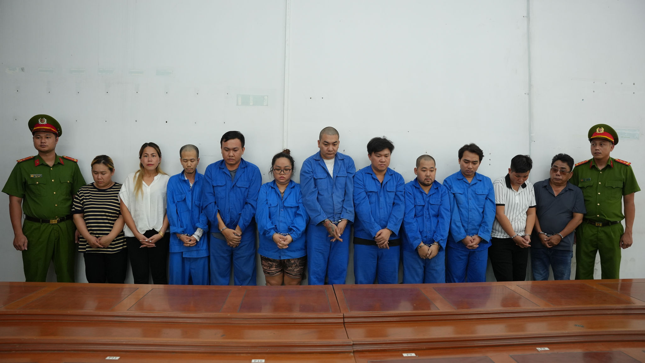 Các bị can tại cơ quan công an. (Ảnh CACC)