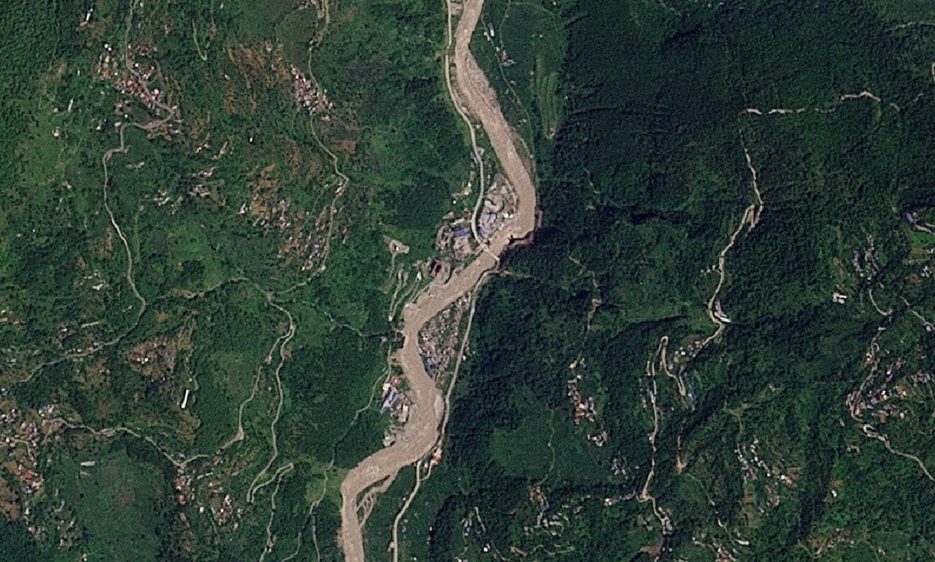 Hình ảnh vệ tinh cho thấy khu vực Manakamana tại Nepal trước khi xảy ra lũ quét, ngày 23/8. (Ảnh: Reuters)