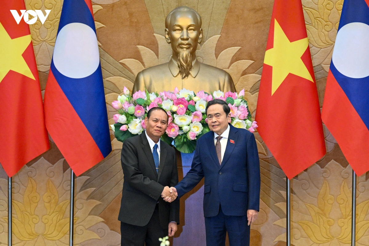 viet nam - lao chia se kinh nghiem hoan thien the che phat trien kinh te hinh anh 2